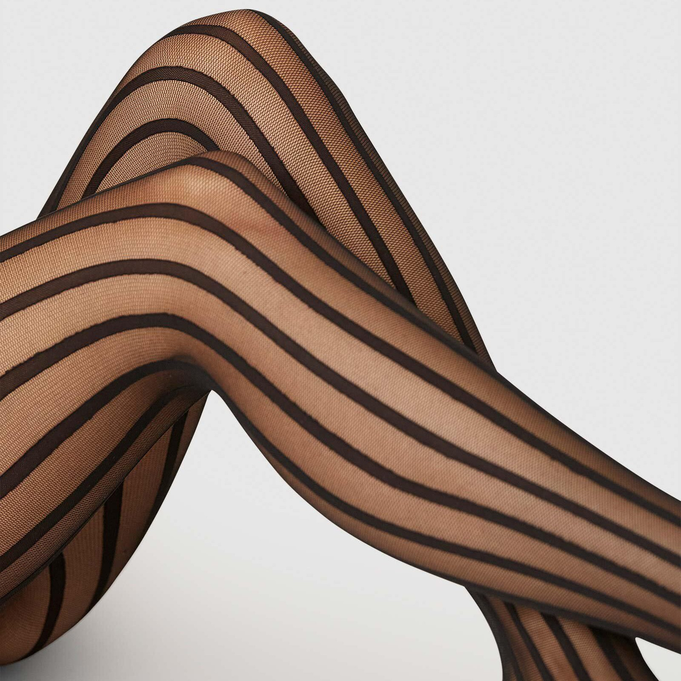Semi-sheer Siri Tights takes stripes to the next level. Dress them up or down for a statement-making look. Sustainability and quality goes hand in hand.